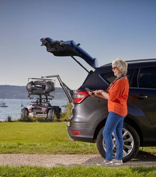 lady using a remote controlled boot hoist