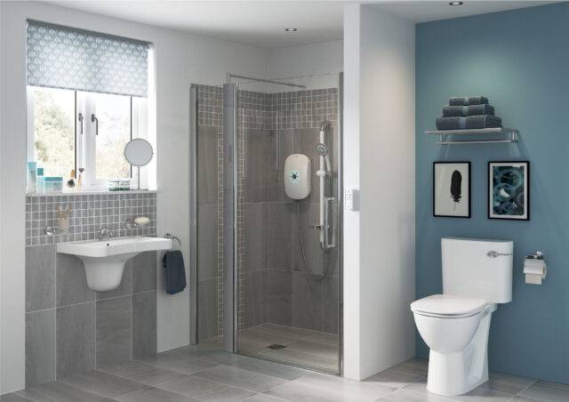 Who can benefit from a wet room blog -minimalistic wet room with grey tiles and a blue feature wall