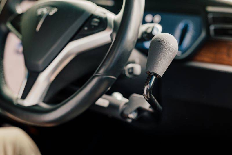 Different types of hand controls for cars mobility in motion