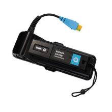 A battery pack for powering a boot hoist. It has a wrist strap and a connector for the boot hoist.