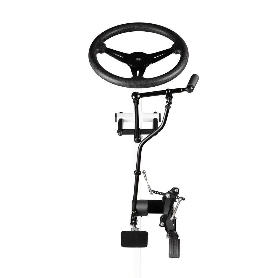 a demonstration rig showing a steering wheel and the pedals of a car and how the hand controls connect to them