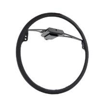 An Over Ring accelerator control for a car. It is a thin black ring connected by a control box to attach to a steering wheel.