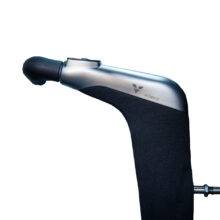 The Veigel eClassic. hand control. A black & silver twist & push handle hand control for accelerating and braking a car. It has a buttons on top to hold the brake
