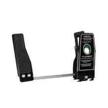 A Left Foot Accelerator Pedal. - A guard to cover the accelerator pedal. Attached to the guard is a second accelerator pedal positioned on the left-hand side of the brake pedal.