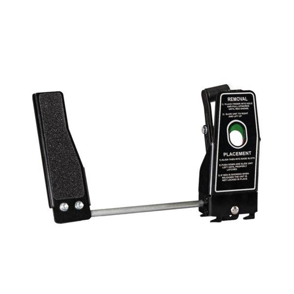 A Left Foot Accelerator Pedal. - A guard to cover the accelerator pedal. Attached to the guard is a second accelerator pedal positioned on the left-hand side of the brake pedal.