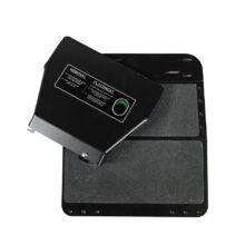 A Quick Release Pedal Guard. A metal plate for the floor of a car's footwell. It is supporting a guard to cover and protect the car's pedals.
