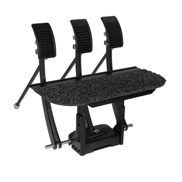 An array of three pedals mounted on a raised floor platform to extend a car's original pedals.