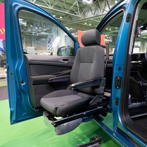 A swivel seat that has turned out of the passenger's seat and lowered outside of the car to allow for easier access to the vehicle