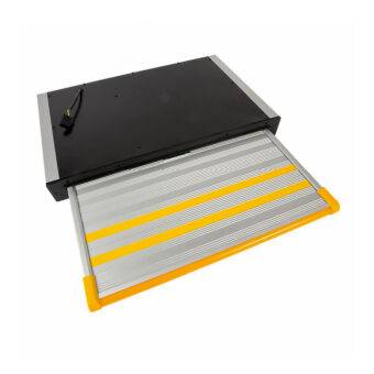 Electric cassette side steps for cars and vans. The thin black box of the mechanism to be mounted under a vehicle extends out with a silver and yellow step.