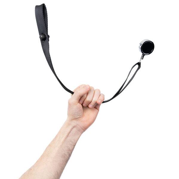 A hand reaching up to grasp a retracting boot strap, a black webbing handle and a subtle retracting mechanism.