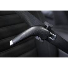 A car seatbelt with an additional handle to aid in connecting and unbuckling the belt
