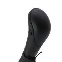 The head of the Carospeed Classic a floor-mounted mechanical push/pull accelerator and brake. A tall black handle with a button on the side to hold the brake.