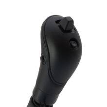 The head of the Carospeed Classic a floor-mounted mechanical push/pull accelerator and brake. A tall black handle with a button on the side to hold the brake and an electronic multi-function button on top.