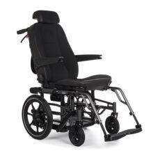 A Carony Wheelchair Swivel seat. The car seat has been transferred out of the car and is positioned on the wheelchair base.