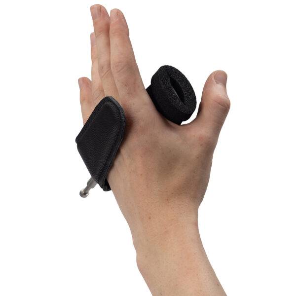 The quick-release specialist steering aid the BraunAbility 2-Pin Specialist Steering Aid. It is a soft foam handle perpendicular to the wheel with a supportive pin to hold the hand in place.