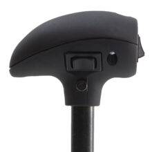The Menox head of the Carospeed Classic a floor-mounted mechanical push/pull accelerator and brake. A tall black handle with a button on the side to hold the brake and an electronic multi-function button on top.