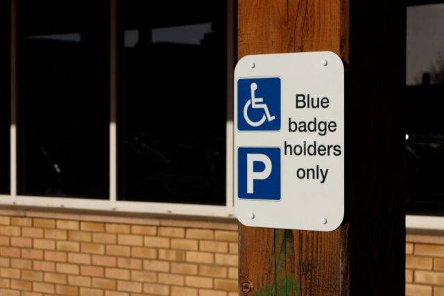 blue badge parking only sign