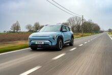 Light blue Kia EV3 on a road