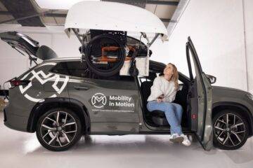 Nicole Brennan sat on drivers side swivel seat while operating a drivers side wheelchair roofbox