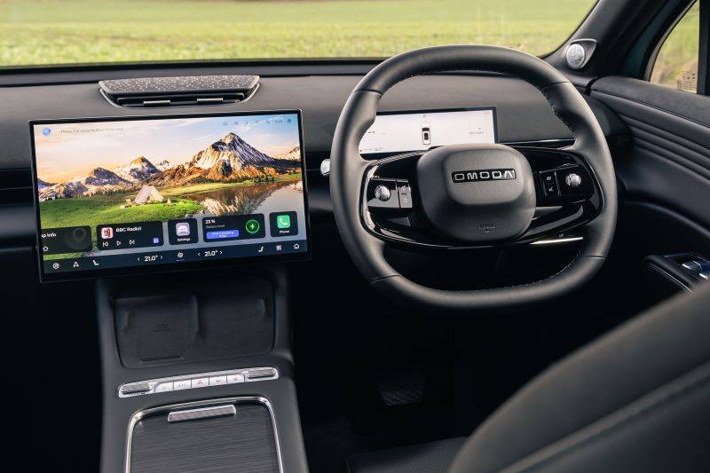 interior shot of dashboard and steering wheel of OMODA 7
