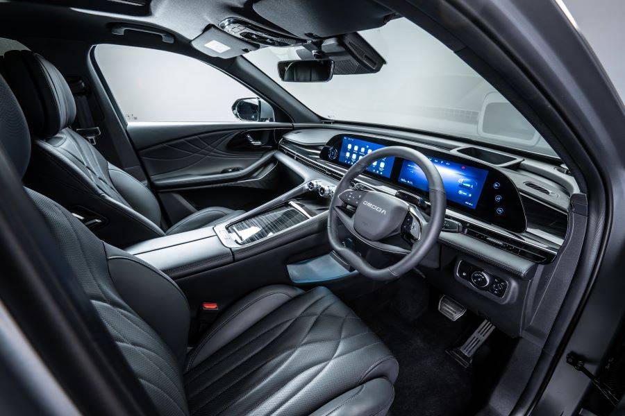 interior shot of front seats and dashboard of OMODA 9